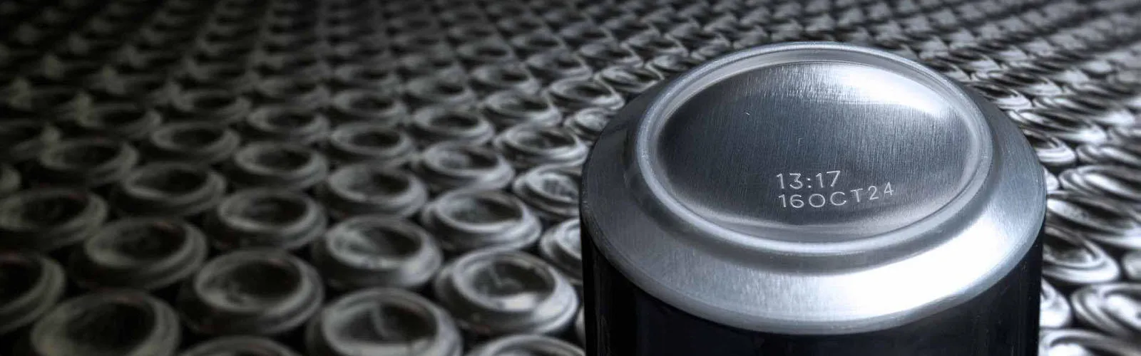Coded beverage can concave bottom
